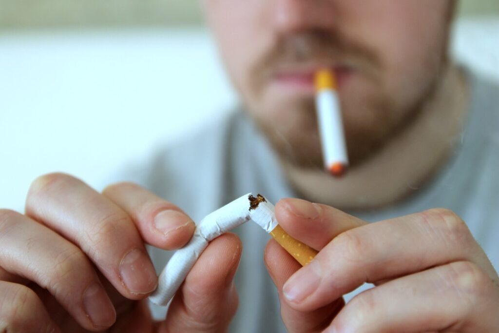 E-Cigarette Use After Quitting Smoking and Lung Cancer Risk: What the Evidence Shows Illustration of lungs with a vapour device and a question mark over cancer risk